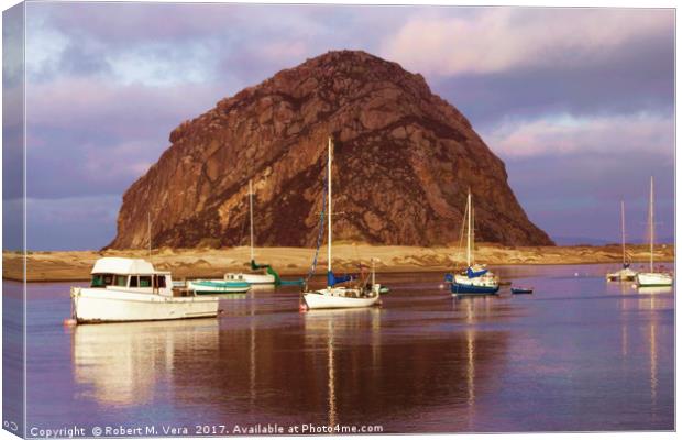 Morro Rock with boats in foreground Canvas Print by Robert M. Vera