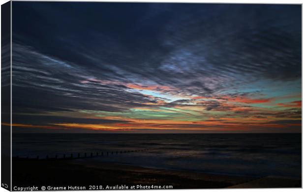 Sunrise at low tide Canvas Print by Graeme Hutson