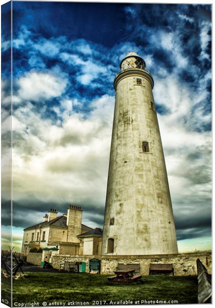Tynemouth Lighthouse Canvas Print by Antony Atkinson