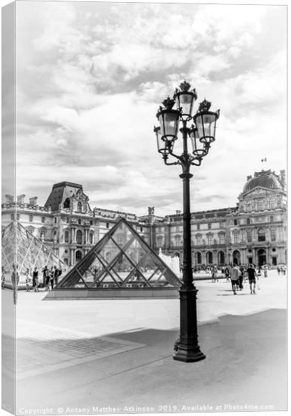 Louvre Museum in Black and White Canvas Print by Antony Atkinson