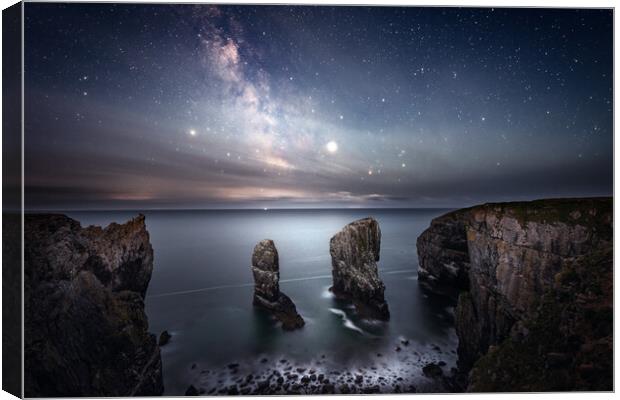 Night sky above the Elegug Stacks - Pembrokeshire Canvas Print by Karl McCarthy