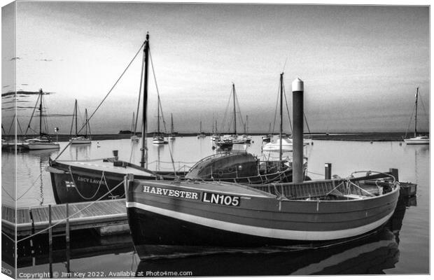 A Whelker and a Lifeboat Wells Harbour Norfolk   Canvas Print by Jim Key