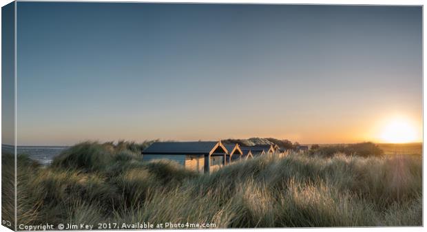 Brancaster Beach Huts Sunrise Norfolk Canvas Print by Jim Key