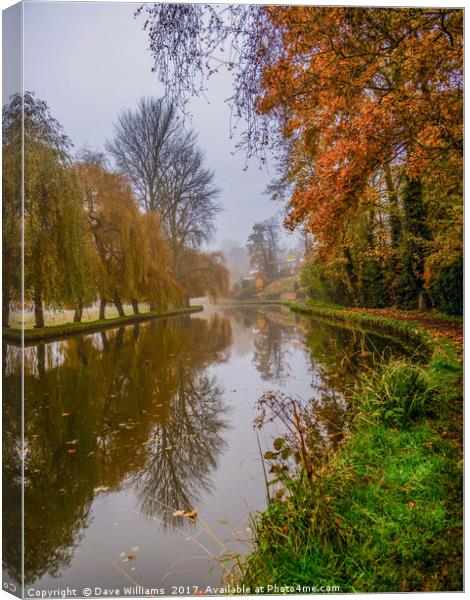 Walking the Canal towpath in Autumn Canvas Print by Dave Williams