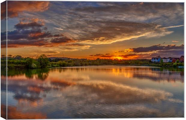 Sunset at Holmethorpe Lagoons Nature Reserve Canvas Print by Dave Williams