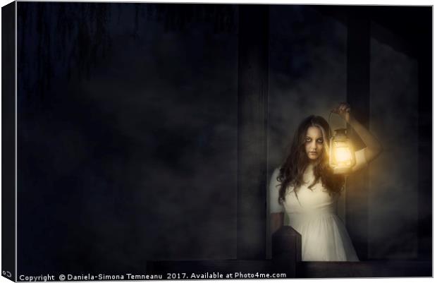 Scary woman with lantern in night scene Canvas Print by Daniela Simona Temneanu
