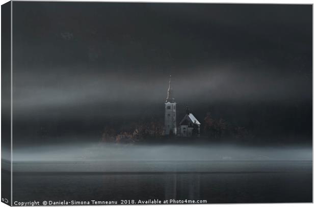 Church on Bled Island in fog Canvas Print by Daniela Simona Temneanu