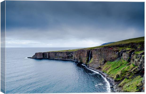 Iceland cliffs at dusk over the sea Canvas Print by Mirko Macari