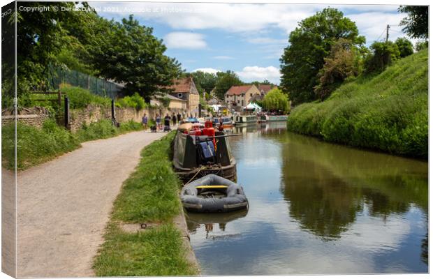 Peaceful Reflections on the Canal Canvas Print by Derek Daniel