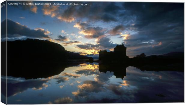 Majestic Sunset at Eilean Donan Castle Canvas Print by Derek Daniel