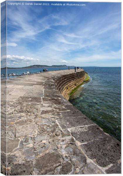 A Romantic Stroll on The Cobb Canvas Print by Derek Daniel