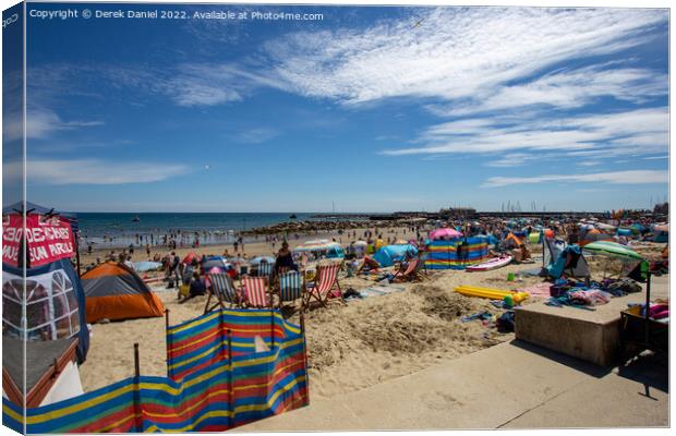 The Vibrant Scene of Lyme Regis Beach Canvas Print by Derek Daniel