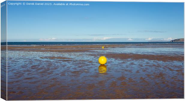 Yellow Buoy's on Benllech Beach, Anglesey Canvas Print by Derek Daniel