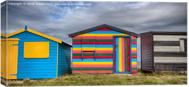Colourful beach huts at Hopeman Canvas Print by Derek Daniel