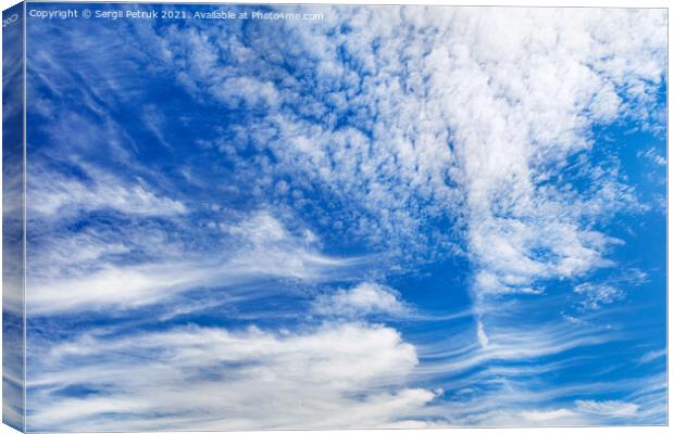 Beautiful blue sky with light white curly clouds. Canvas Print by Sergii Petruk
