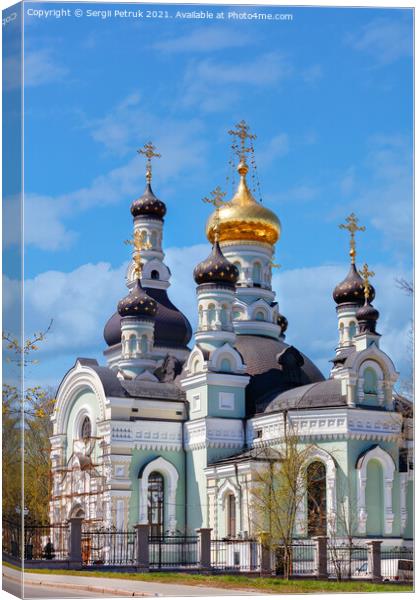 Christian temple under construction against the background of the spring blue sky. Canvas Print by Sergii Petruk