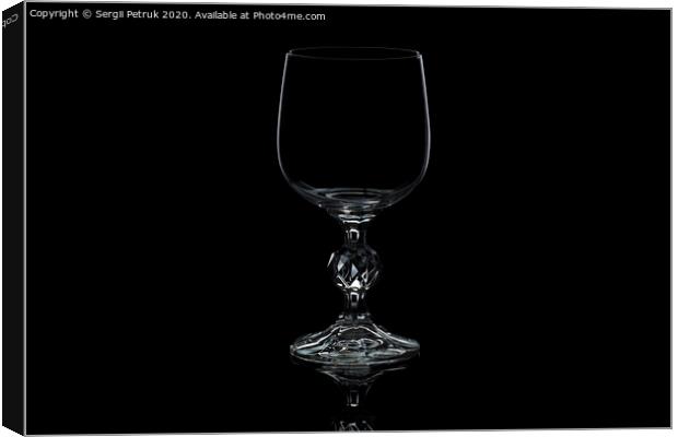 glass wine glass isolated on a black background Canvas Print by Sergii Petruk