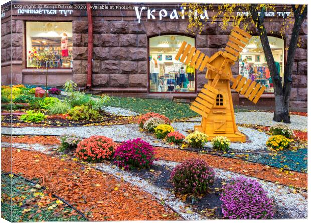 bright color area in front of the store Ukraine in the center of Kyiv on a rainy day of October 2017 Canvas Print by Sergii Petruk