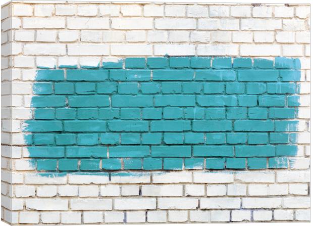 On the white old brick wall the selected fragment is painted with green paint. Canvas Print by Sergii Petruk