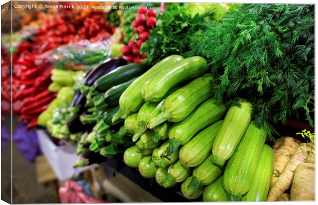 Juicy greens of zucchini, dill, parsley and eggplant, radish, is on the market for sale Canvas Print by Sergii Petruk