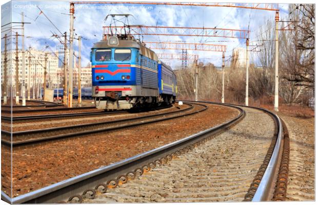 Perspective and turn of a multichannel railway for electric trains Canvas Print by Sergii Petruk