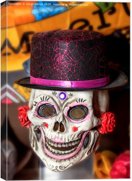 Halloween, skull doll with female makeup and a black-red hat, isolated on a blurred background. Canvas Print by Sergii Petruk