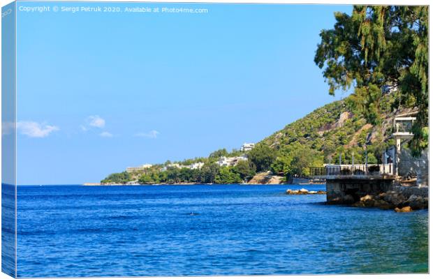 Beautiful views of the steep rocky slope of the Gulf of Corinth and the blue lagoon on the coast. Canvas Print by Sergii Petruk