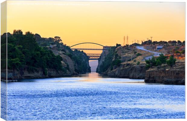 View of the transport bridges over the Corinth Canal in Greece against the morning light of the beginning day. Canvas Print by Sergii Petruk