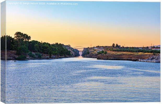 The Corinth Canal in the morning summer day illuminates the bright rising sun of Greece. Canvas Print by Sergii Petruk