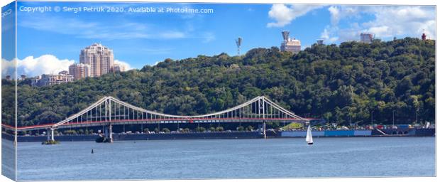 Panorama of the city of Kyiv, a view of the Dnipro River and a pedestrian bridge. Canvas Print by Sergii Petruk