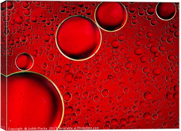Red bubbles. Oil and liquid abstract.  Canvas Print by Judith Flacke