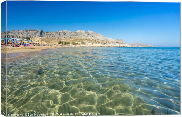 Agathi Beach on the Island of Rhodes Greece Canvas Print by Ian Woolcock