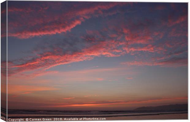 Fluffy pink clouds during sunset at Pismo Beach, C Canvas Print by Carmen Green