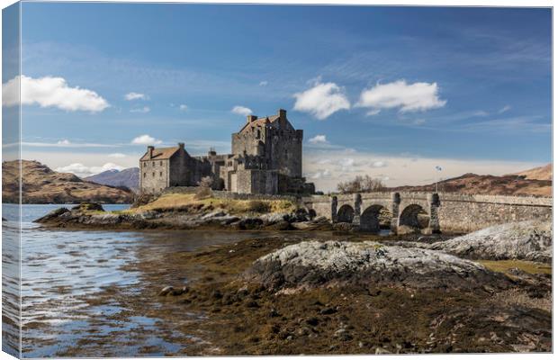 Eilean Donan Castle on a sunny day Canvas Print by Peter Scott