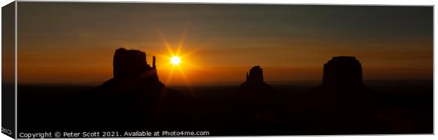 Sunrise & silhouettes at Monument Valley Canvas Print by Peter Scott