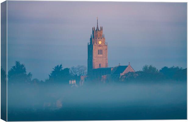 St Andrew's Church, Sutton-in-the-Isle, emerges from the morning Canvas Print by Andrew Sharpe