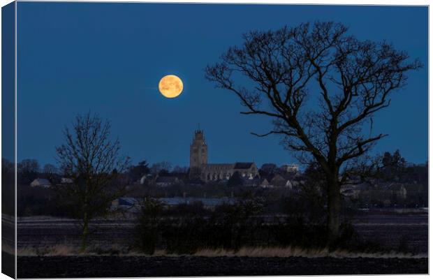Wolf Moon setting over St Andrew's Chrurch, Sutton Canvas Print by Andrew Sharpe