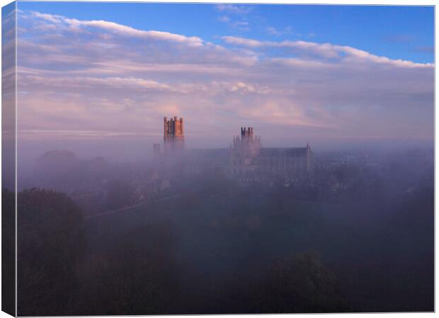 Dawn over a misty Ely Cathedral, 5th November 2020 Canvas Print by Andrew Sharpe