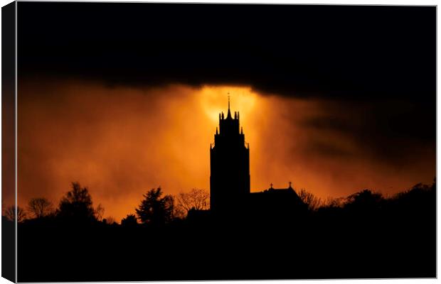 Sunset behind St Andrew's Church tower Canvas Print by Andrew Sharpe