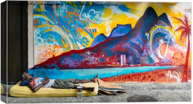 Afro-Brazilian man sleeps rough on a street with a Canvas Print by Alexandre Rotenberg