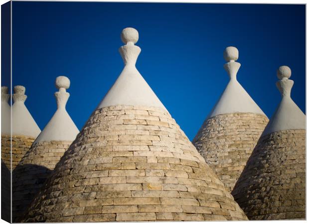 Trulli roofs Canvas Print by Roger Warham
