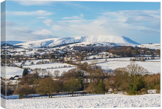 Snow Covered Pendle Hill  Canvas Print by Tony Keogh