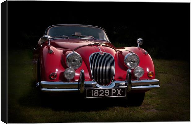 Classic Jaguar XK150 Roadster in Red Canvas Print by Donnie Canning
