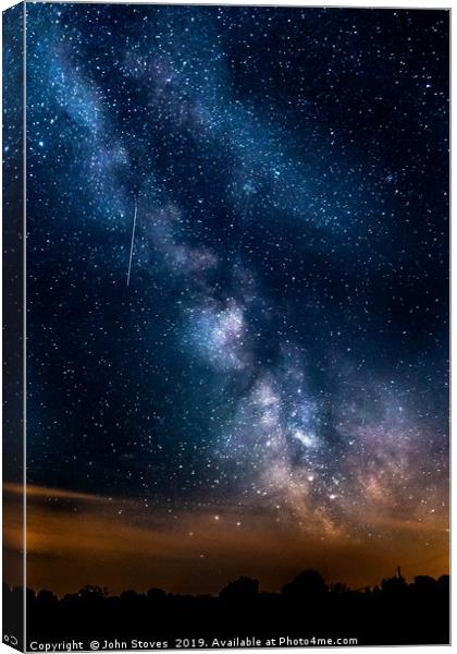 The Milky Way and a shooting Star Canvas Print by John Stoves