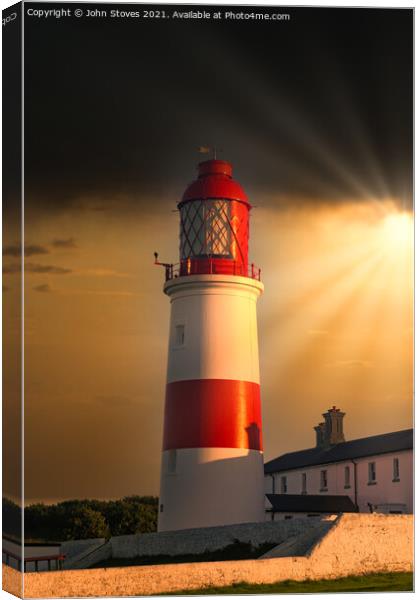 Lighthouse at Sunset Canvas Print by John Stoves