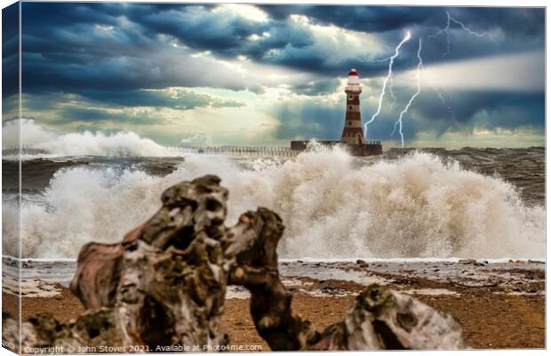 Lighthouse Storm Canvas Print by John Stoves
