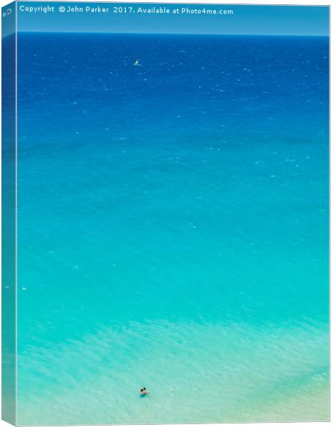 Turquoise Sea Canvas Print by John Parker