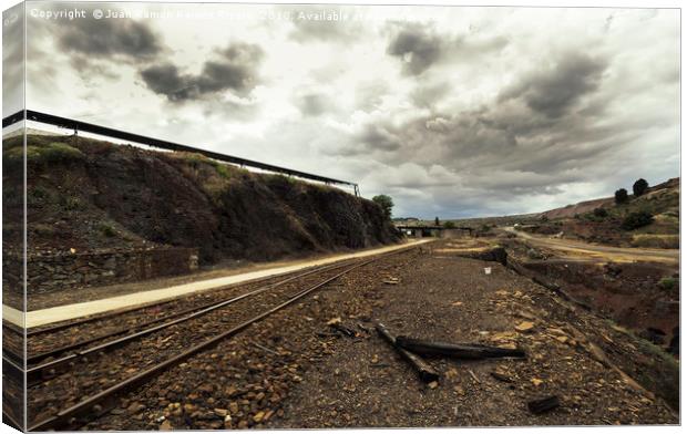 Old railroad track in the mines Canvas Print by Juan Ramón Ramos Rivero