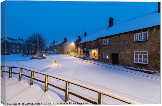 A Winters Snow Storm in Brigstock Northamptonshire Canvas Print by James Aston