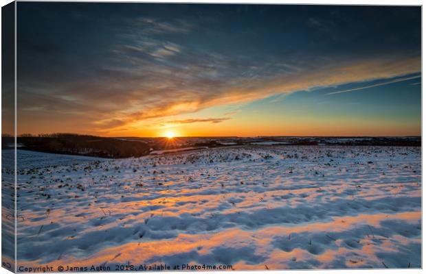 Winter Sunset Canvas Print by James Aston